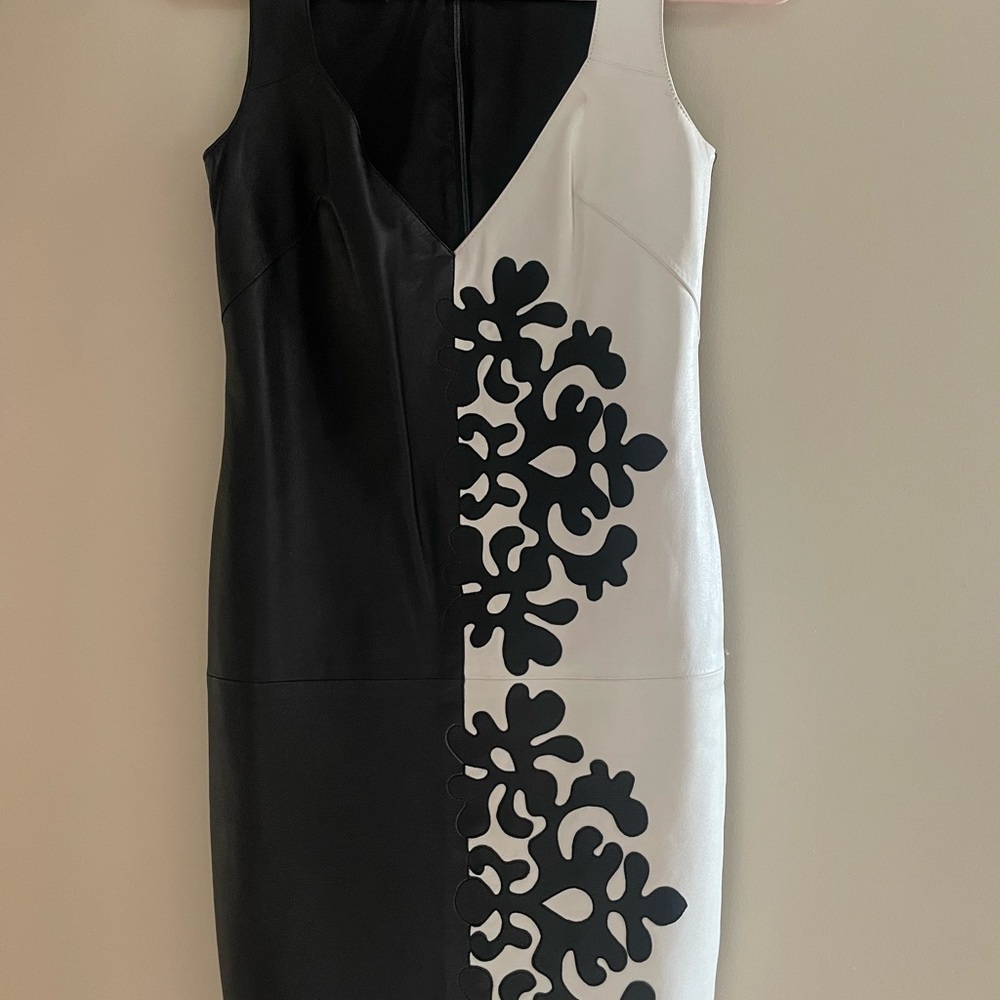 EU designer leather Black and White mini dress, deep V, NWOT